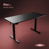 Black adjustable desk on a dark red background with text 'Rise to every hour.'